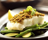 Fish with herb crust on green beans