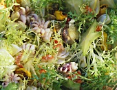 Curly endive with seafood and carambolas (close-up)