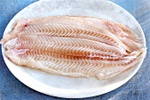 Two sole fillets on plate