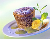 Chocolate soufflé with bananas and mint sauce
