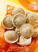 Poppy seed muffins with icing sugar