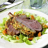 Breaded lamb chops on salad