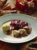 Venison with apple and red cabbage and potato dumpling