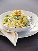 Ribbon pasta with broccoli and pine nuts