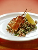 Chicken kebabs on tabbouleh