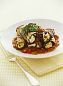 Aubergine rolls with ricotta, tomato sauce and pesto