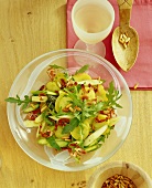 Potato salad with asparagus, rocket and pine nuts