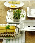 Various serving dishes for asparagus