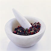 Mixed peppercorns in mortar