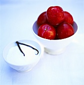 Plums and sugar with vanilla pod