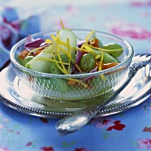 Spicy fruit salad with rose petals