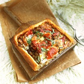 Puff pastry pizza with bacon, mushrooms and cheese