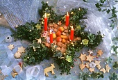 Advent wreath with biscuits and marzipan fruit