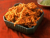 Kandyachi Bhaji (frittierte Zwiebeln), Maharashtra, Indien