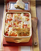 Asparagus lasagne with salmon and tomatoes