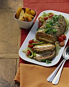 Meatloaf with feta; fried potatoes