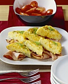 Chive omelettes with ham; tomato salad