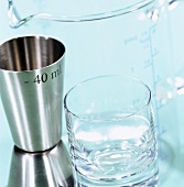 Measuring jug and empty glass