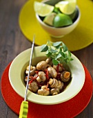 Mushrooms braised in sherry with bacon; limes