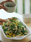 Vegetable salad with chicken and mint