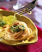 Spaghetti with pesto and pine nuts