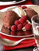 Mousse au chocolat with cream and fresh raspberries