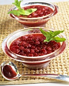 Raspberry jelly with mint leaves