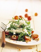 Rocket salad with cherry tomatoes, pine nuts & Parmesan