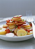 Potato and radish salad with diced tomatoes