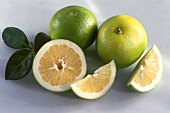 Pomelos, whole and cut open