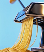 Home-made spaghetti in the pasta maker