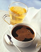A Cup of Black Coffee and a Mug of Lemon Tea