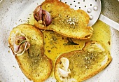 Fettunta (Toasted garlic bread with oil and herbs)