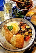 Greek lemon drumsticks with rice and vegetables