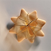 A ginger star with ginger sticks and gold threads