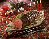 Roast beef on vegetables for Christmas