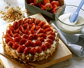 Strawberry cake with flaked almonds