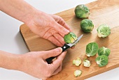 Cutting a cross into Brussels sprouts 