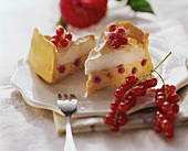 Two pieces of redcurrant meringue tart