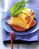 Potato and cheese lasagne on beetroot whip