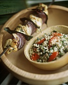 Fish and onion kebabs with bulgur salad