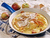 Omelette with apple slices and bacon