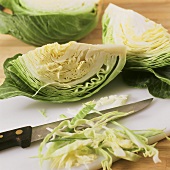 Cutting white cabbage into strips