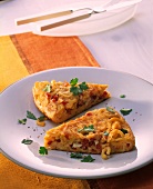 Pasta omelette with salami and mozzarella filling