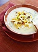 Potato soup with sweetcorn and fish
