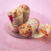 Cranberry muffins wrapped in paper