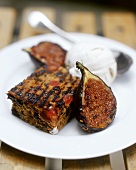 Grilled figs with Christmas cake and vanilla ice cream
