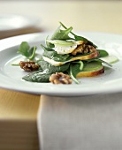 Spinach salad with smoked cheese and walnuts