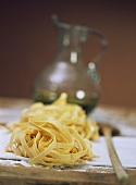 Home-made ribbon pasta and olive oil