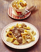 Venison escalope, cream sauce, mushrooms & ribbon pasta (Swiss)